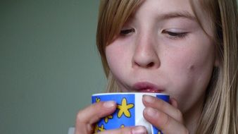 girl drinking tea