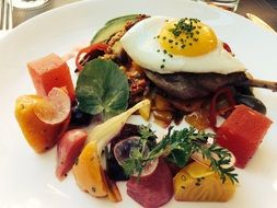 vegetables with scrambled eggs on a plate