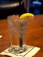 lemon and water with ice, cocktail in glass