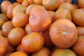 small organic oranges fruit close-up