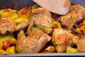 Baked chicken with potato vegetables and spices