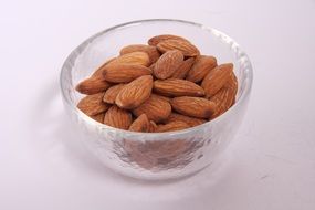 almond in a transparent plate