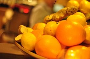 orange color fruit on plate