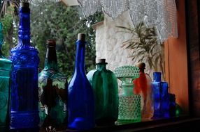 green and blue decorative bottles