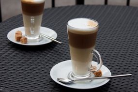 two glasses with latte