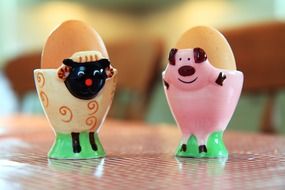 Breakfast eggs in the colorful ceramic eggcups
