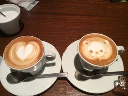 Beautiful served latte in cups