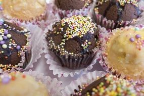 Cupcakes decorated with colored sprinkles