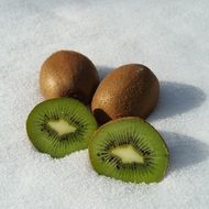 organic kiwi fruit on snow