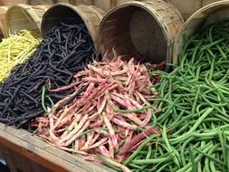 colorful bean pods on the market