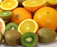 oranges and kiwi fruits in the cut