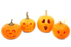 carved pumpkins on a white background