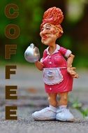 decoration in a cafe in the form of a funny waitress