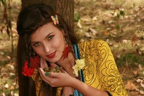 portrait of a girl on the background of autumn nature