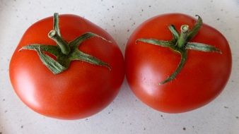 tomatoes with green tails