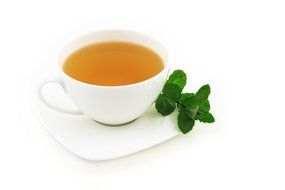 cup of tea with mint leaves