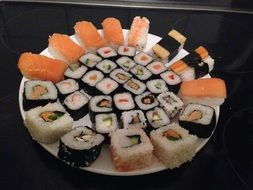 a variety of sushi on a plate
