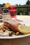 salmon with lemon on a plate