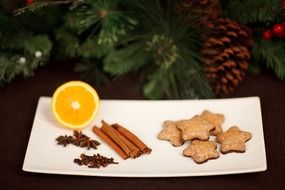 cinnamon cookies and mulled spices on a plate