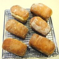 White mini bread on the grill