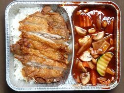 roasted duck with rice and vegetables