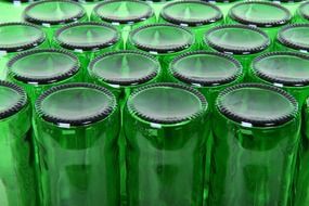 the bottom of the green bottles