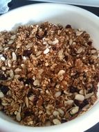 muesli in a white bowl close-up