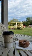 coffee and donut on the white table