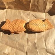 bungeoppang, korean fish shaped pastry on brown paper