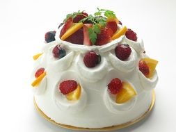 vanilla dessert with strawberries and oranges