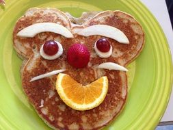 sweet pancake in the shape of a face