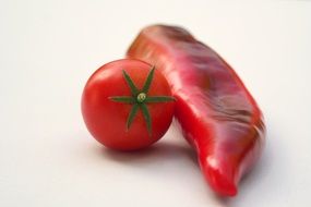 red pepper and red tomato