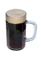 a glass of dark beer on white