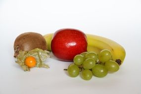 composition of apple, kiwi, banana, grapes and physalis