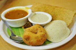 indian food with curry sauce in a restaurant