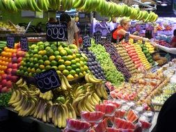 market stall with colorful fruit outdoors