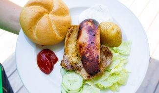 food with sausage and bun