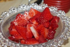 Sliced strawberries in a glass plate