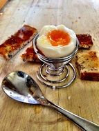 Boiled egg for breakfast with toastes