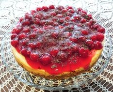 cherry cheesecake on a glass plate