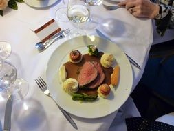 restaurant dish with meat and vegetables