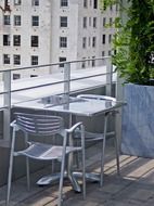 modern table at rooftop terrace sunny scene