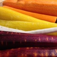 peeled multicolored carrots close-up