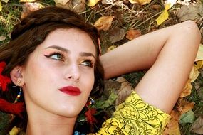 Girl with make-up in the autumn style