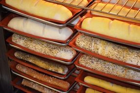 bakery pastry in trays on a rack