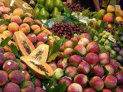 papaya, apples and other fruits on the market
