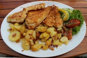 fried potatoes and flatfish fillet