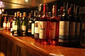 bottled wine on a wooden chest