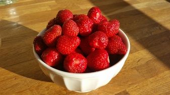 fresh strawberry in white bowl