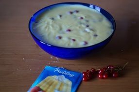 currant pudding in blue bowl